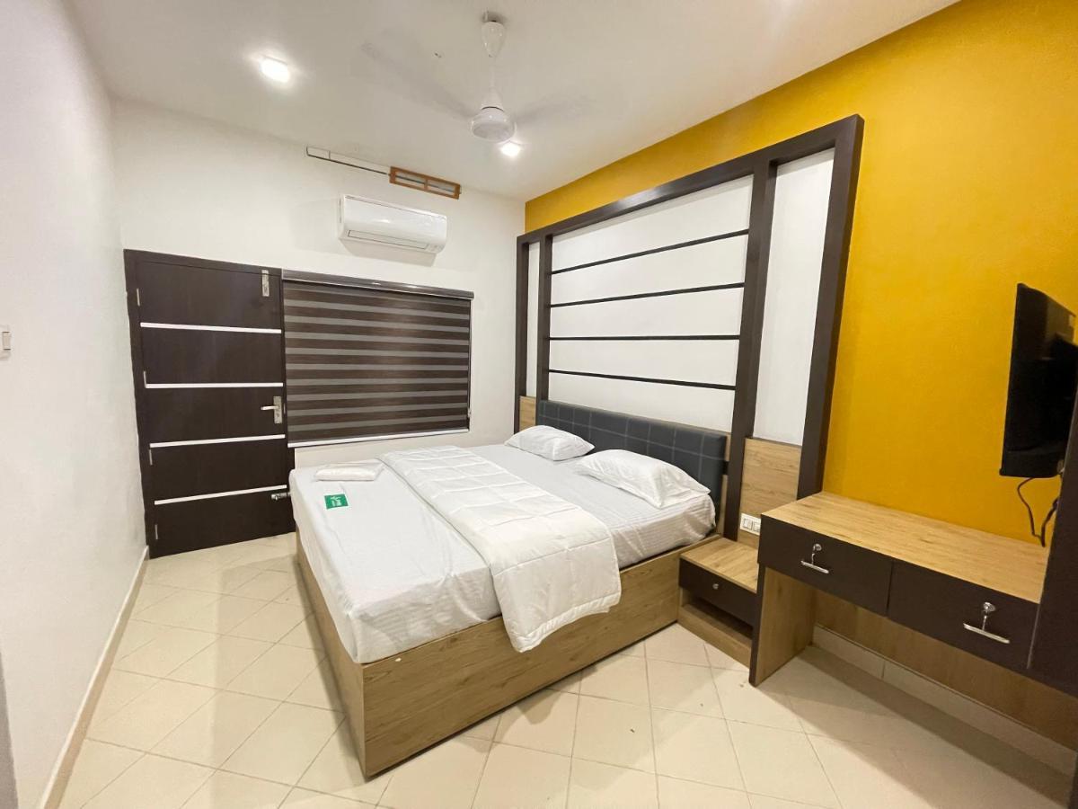 Pmr Grandays Hotel มาลัพปูรัม ภายนอก รูปภาพ