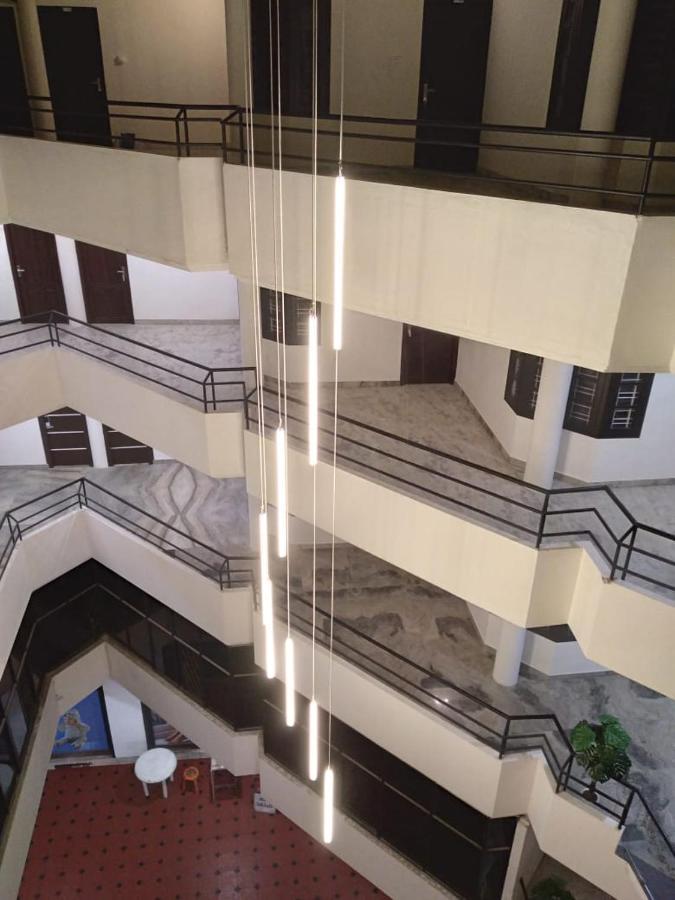 Pmr Grandays Hotel มาลัพปูรัม ภายนอก รูปภาพ